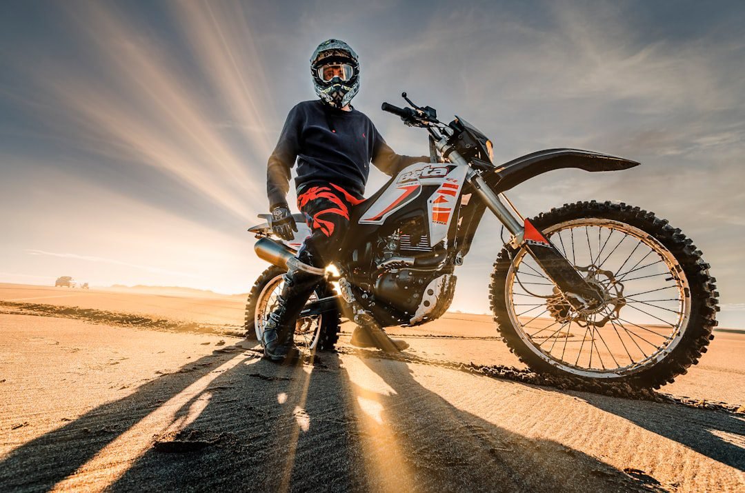Rider on an electric dirt bike on a trail