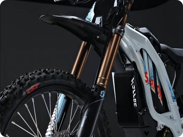 Surron electric dirt bike suspension fork and frame close-up